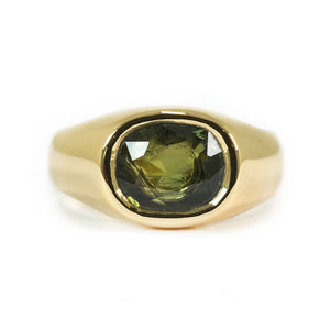 GOLD SIGNET WITH AN INCLUDED GREEN SAPPHIRE