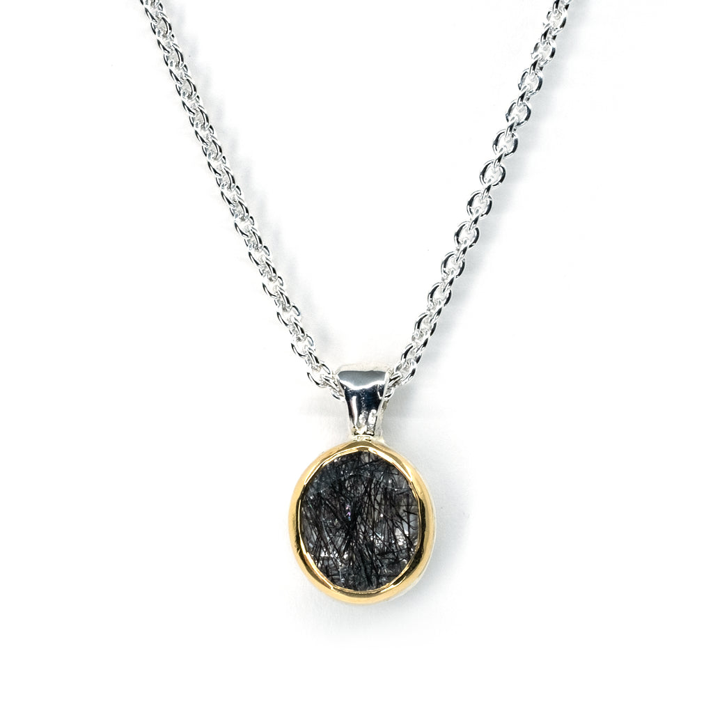 GOLD BEZEL TOURMALATED QUARTZ PENDANT