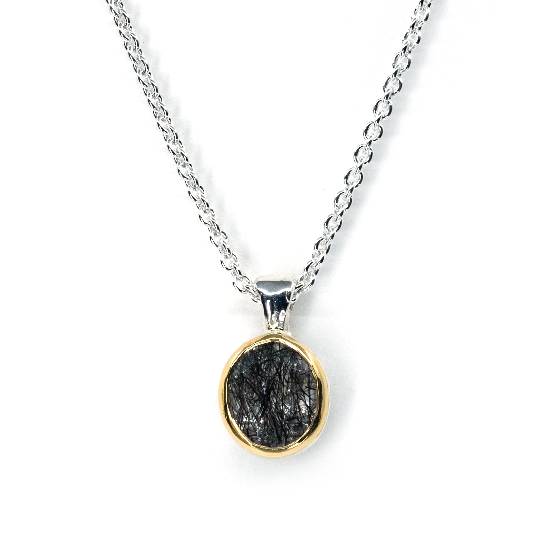 GOLD BEZEL TOURMALATED QUARTZ PENDANT