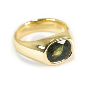 GOLD SIGNET WITH AN INCLUDED GREEN SAPPHIRE